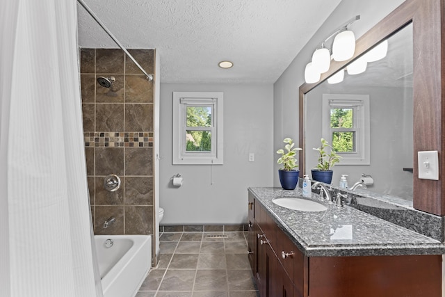 1292 Churchbell Way, Columbus, OH 43235 - bathroom with vanity, healthy amount of natural light, shower / tub combination, and a textured ceiling