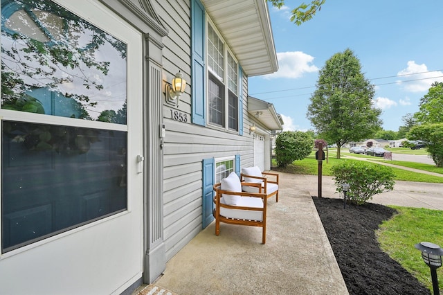 1853 Shasta Dr, Lancaster, OH 43130 - view of patio / terrace featuring a garage