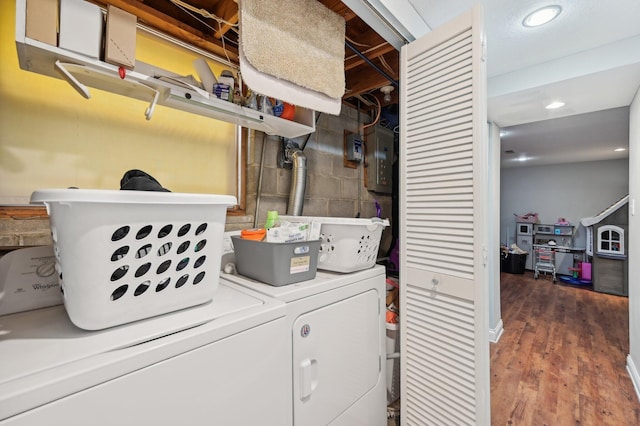 1853 Shasta Dr, Lancaster, OH 43130 - washroom featuring washer and dryer, wood finished floors, recessed lighting, concrete block wall, and electric panel