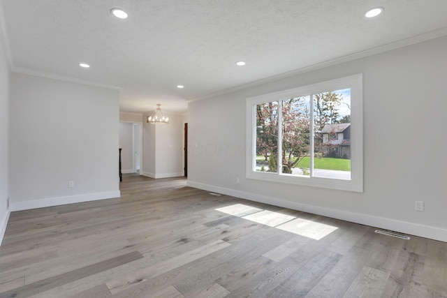 5200 Colt Ct, Westerville, OH 43081 - spare room featuring crown molding, a chandelier, recessed lighting, and wood finished floors