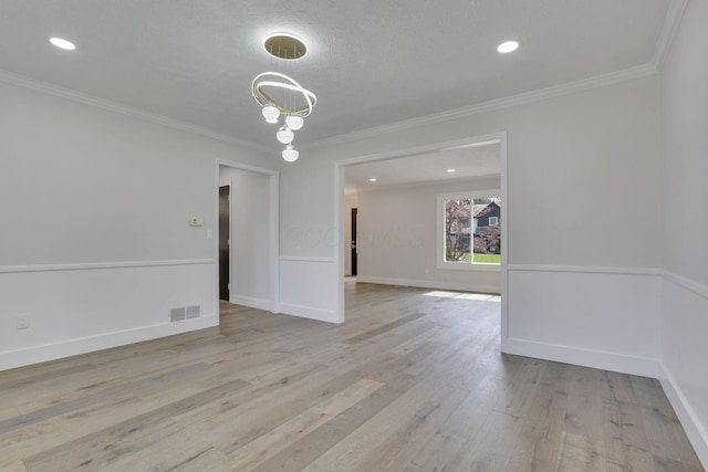 5200 Colt Ct, Westerville, OH 43081 - unfurnished room with wood finished floors, ornamental molding, recessed lighting, and a chandelier