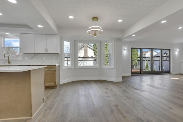 5200 Colt Ct, Westerville, OH 43081 - kitchen with open floor plan, plenty of natural light, light wood-style floors, light countertops, and recessed lighting