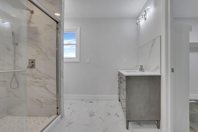 5200 Colt Ct, Westerville, OH 43081 - full bathroom featuring a stall shower, vanity, and marble finish flooring