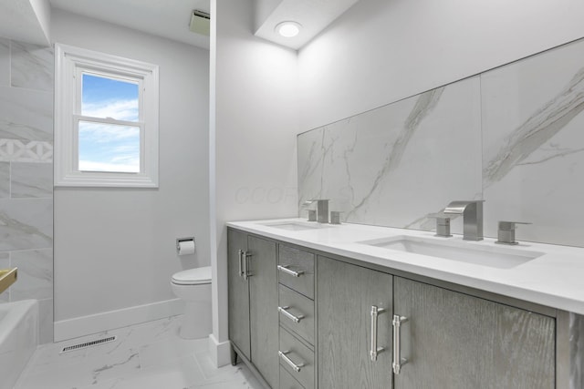 5200 Colt Ct, Westerville, OH 43081 - bathroom featuring double vanity and marble look tile flooring