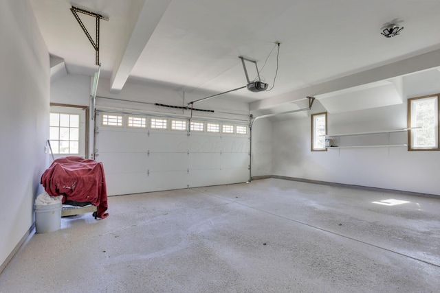 5200 Colt Ct, Westerville, OH 43081 - garage featuring baseboards and a garage door opener