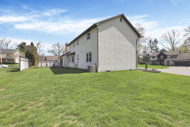 5200 Colt Ct, Westerville, OH 43081 - view of property exterior with stucco siding and a chimney