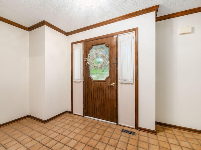 2247 Sonnington Dr, Dublin, OH 43016 - entrance foyer with crown molding and a textured ceiling