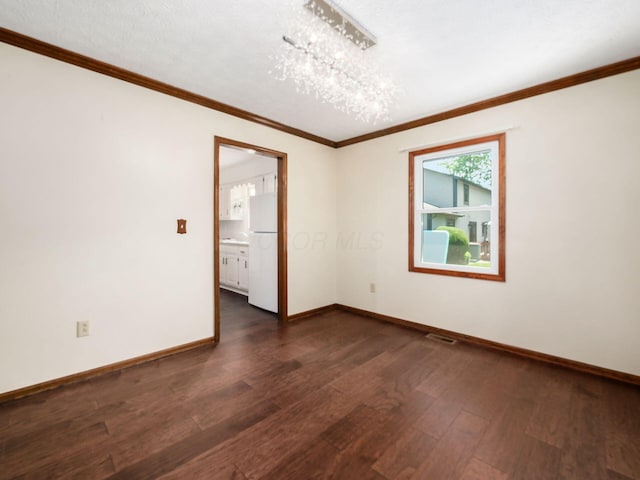 2247 Sonnington Dr, Dublin, OH 43016 - unfurnished room with dark wood finished floors and crown molding
