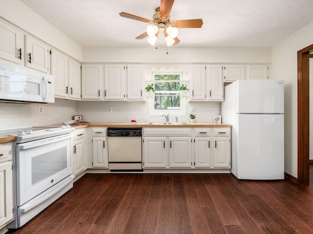 2247 Sonnington Dr, Dublin, OH 43016 - kitchen featuring white appliances, dark wood-type flooring, white cabinetry, and a textured ceiling