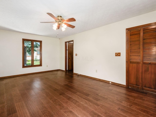 2247 Sonnington Dr, Dublin, OH 43016 - empty room featuring a ceiling fan and dark wood-type flooring