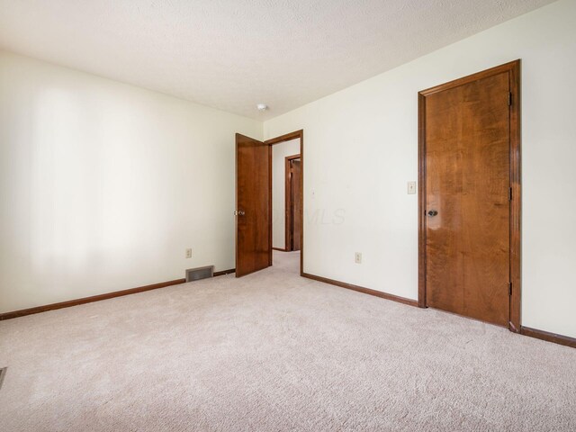 2247 Sonnington Dr, Dublin, OH 43016 - spare room featuring light colored carpet