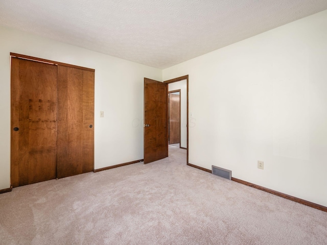 2247 Sonnington Dr, Dublin, OH 43016 - unfurnished bedroom with light colored carpet and a closet