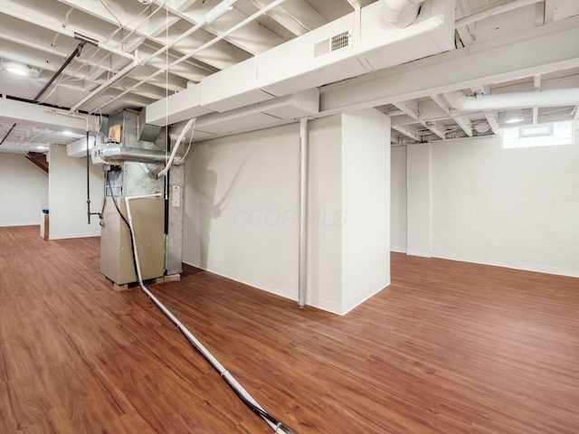 2247 Sonnington Dr, Dublin, OH 43016 - basement featuring wood finished floors and heating unit