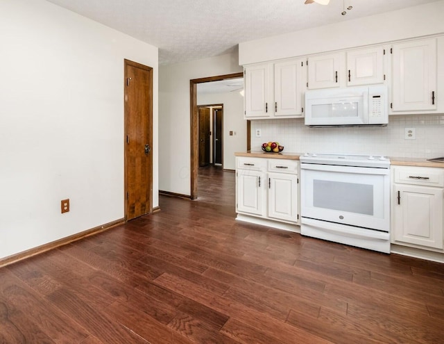 2247 Sonnington Dr, Dublin, OH 43016 - kitchen with white appliances, white cabinets, light countertops, and dark wood-style flooring