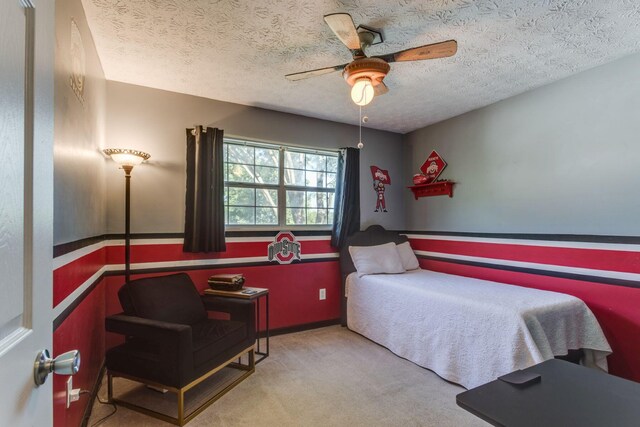 691 Heritage Blvd, Delaware, OH 43015 - bedroom featuring a textured ceiling, carpet flooring, and ceiling fan
