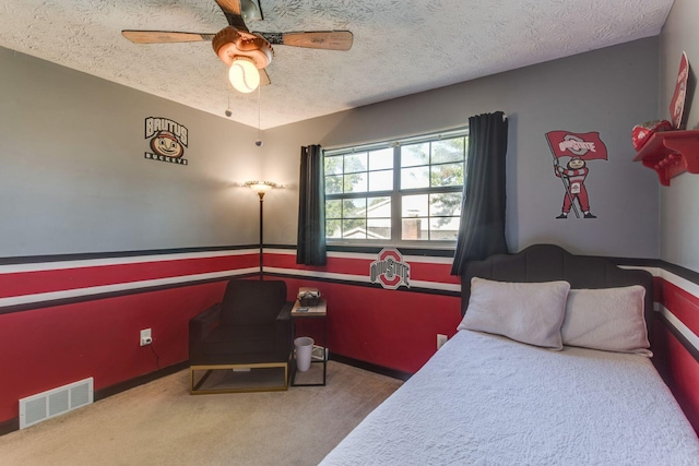 691 Heritage Blvd, Delaware, OH 43015 - carpeted bedroom featuring a textured ceiling and ceiling fan