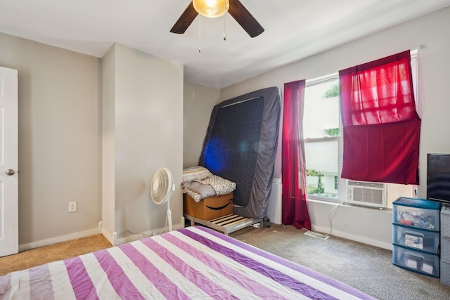 137 Wisconsin Ave, Columbus, OH 43222 - bedroom with multiple windows, carpet floors, ceiling fan, and cooling unit
