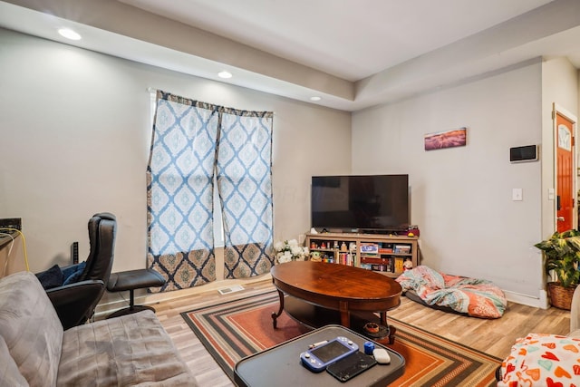 137 Wisconsin Ave, Columbus, OH 43222 - living room featuring wood finished floors and recessed lighting
