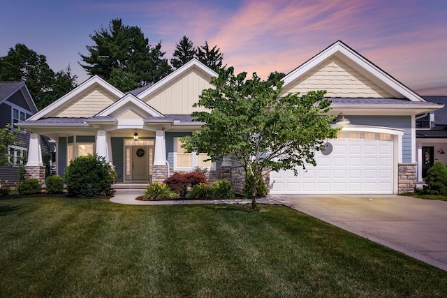 174 Grand Ridge Ct, Gahanna, OH 43230 - craftsman inspired home featuring stone siding, a front yard, concrete driveway, board and batten siding, and a garage