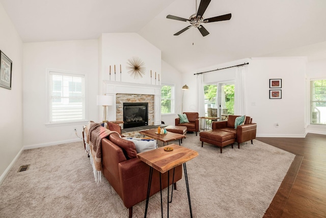 174 Grand Ridge Ct, Gahanna, OH 43230 - living area featuring healthy amount of natural light, high vaulted ceiling, ceiling fan, wood finished floors, and a fireplace