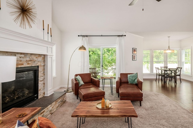 174 Grand Ridge Ct, Gahanna, OH 43230 - living area featuring healthy amount of natural light, a ceiling fan, wood finished floors, and a fireplace
