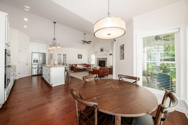 174 Grand Ridge Ct, Gahanna, OH 43230 - dining area with a ceiling fan, a stone fireplace, dark wood finished floors, lofted ceiling, and recessed lighting