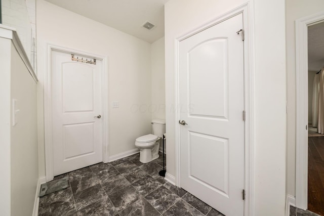 174 Grand Ridge Ct, Gahanna, OH 43230 - bathroom with baseboards and toilet