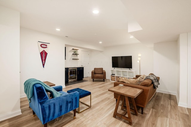 174 Grand Ridge Ct, Gahanna, OH 43230 - living room featuring wine cooler, light wood-style flooring, and recessed lighting