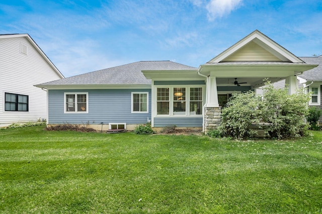 174 Grand Ridge Ct, Gahanna, OH 43230 - rear view of property featuring a ceiling fan, a lawn, and roof with shingles