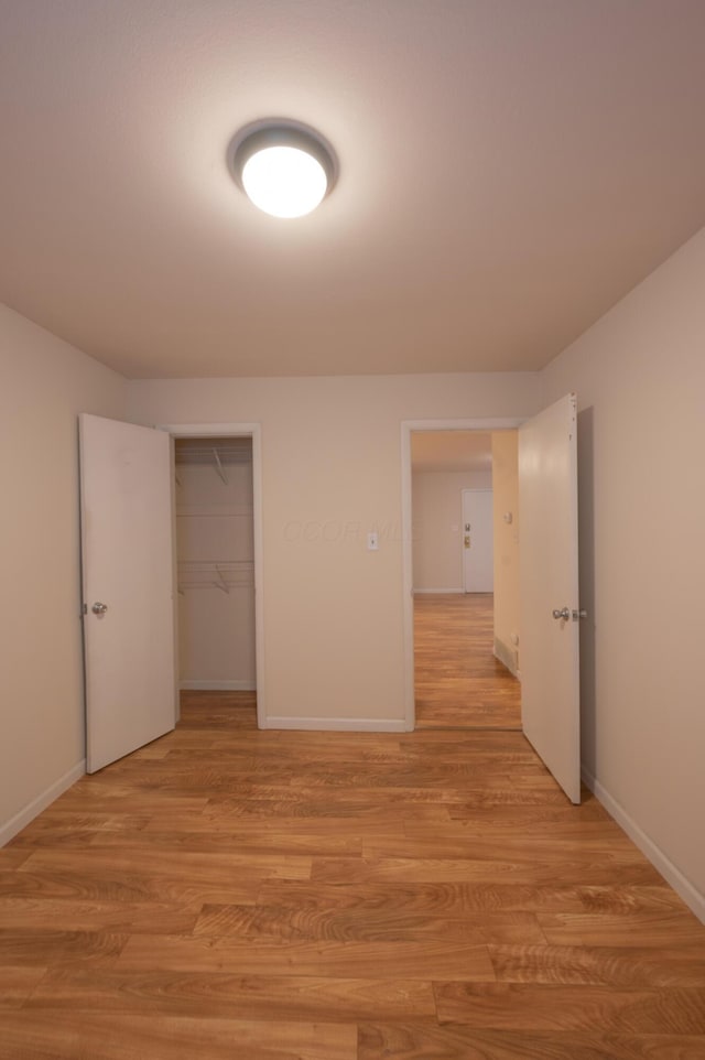 433 E 13th Ave, Columbus, OH 43201 - corridor featuring light wood-style flooring and baseboards
