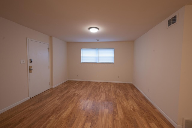433 E 13th Ave, Columbus, OH 43201 - unfurnished room with light wood-style floors and baseboards