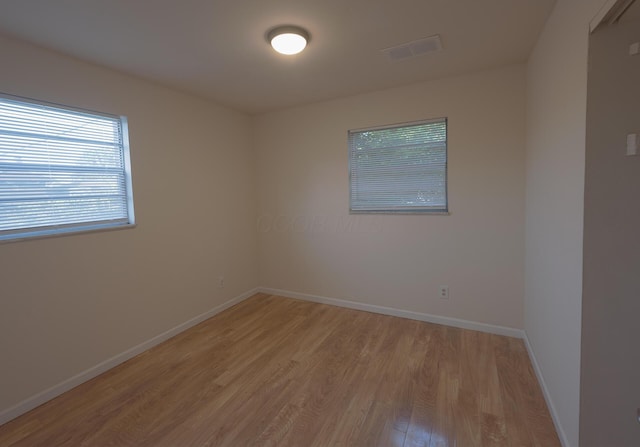 433 E 13th Ave, Columbus, OH 43201 - spare room with light wood-style floors and baseboards