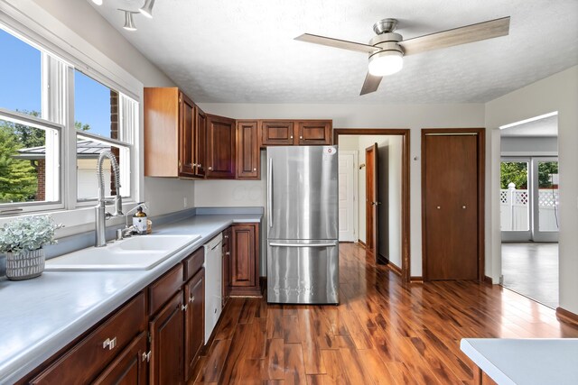 1550 Hiner Rd, Orient, OH 43146 - kitchen with freestanding refrigerator, dark wood-style floors, a ceiling fan, light countertops, and white dishwasher