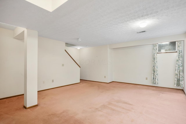 1176 Cambridge Way, Pickerington, OH 43147 - basement featuring carpet floors, a textured ceiling, and stairs