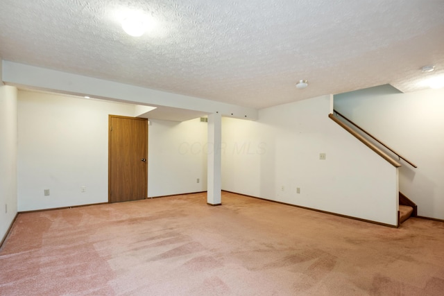 1176 Cambridge Way, Pickerington, OH 43147 - finished below grade area featuring carpet floors, a textured ceiling, and stairway