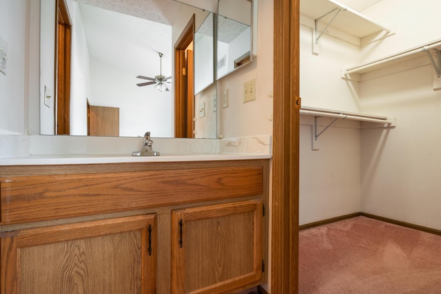 1176 Cambridge Way, Pickerington, OH 43147 - bathroom with a ceiling fan, vanity, lofted ceiling, and a spacious closet