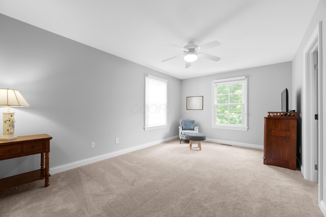 1359 White Oak Ln, New Albany, OH 43054 - living area featuring a ceiling fan and carpet flooring