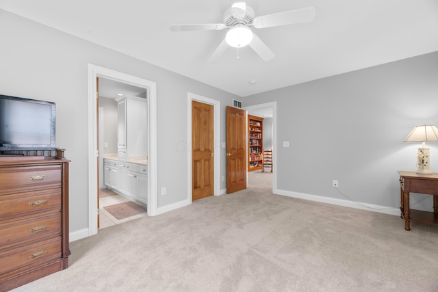 1359 White Oak Ln, New Albany, OH 43054 - bedroom featuring light carpet, connected bathroom, and a ceiling fan