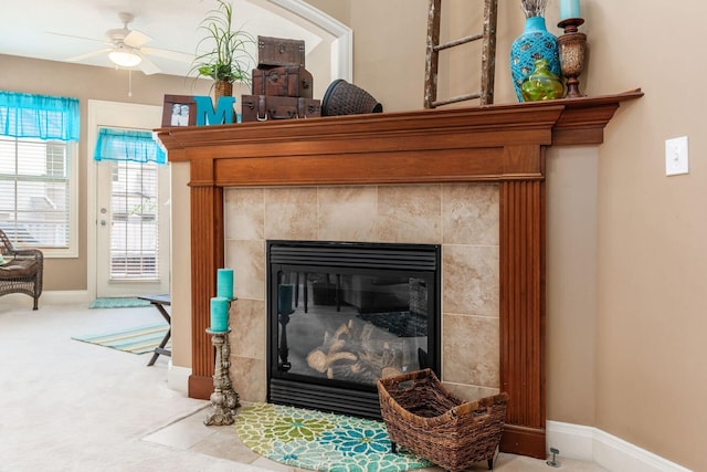 993 Starlight Ln, Westerville, OH 43082 - detailed view of a fireplace, ceiling fan, and carpet