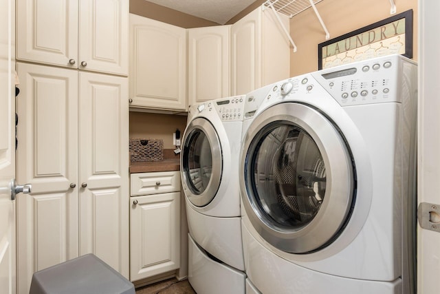 993 Starlight Ln, Westerville, OH 43082 - laundry area with independent washer and dryer and cabinet space