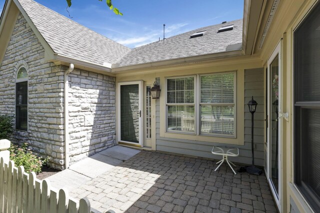 786 Stone Ridge Way, Newark, OH 43055 - property entrance with a patio and a shingled roof