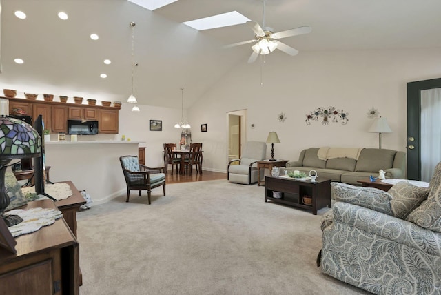 786 Stone Ridge Way, Newark, OH 43055 - living area with light colored carpet, a ceiling fan, a skylight, high vaulted ceiling, and recessed lighting