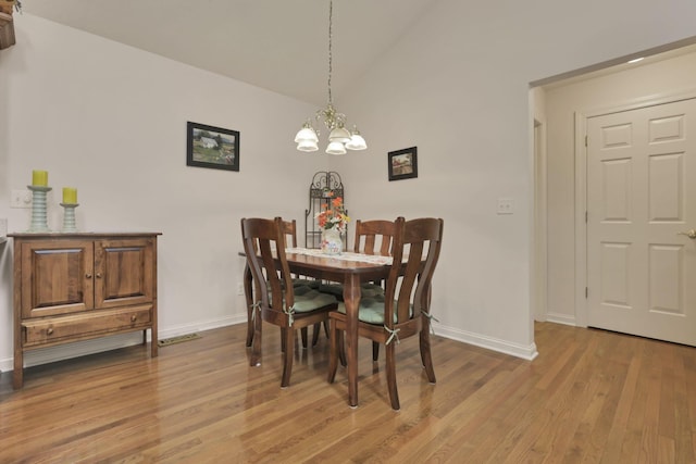 786 Stone Ridge Way, Newark, OH 43055 - dining area with wood finished floors and a chandelier