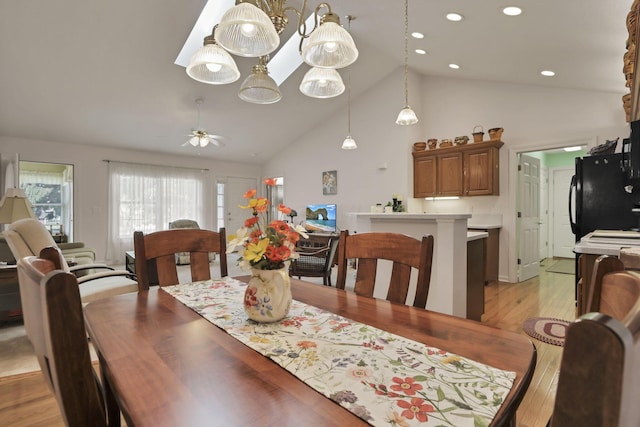 786 Stone Ridge Way, Newark, OH 43055 - dining area with healthy amount of natural light, a ceiling fan, light wood finished floors, recessed lighting, and high vaulted ceiling