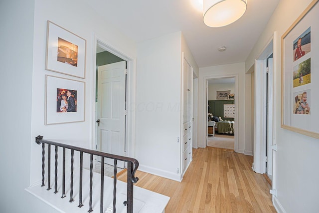 922 S Remington Rd, Columbus, OH 43209 - hall with light wood-type flooring and an upstairs landing