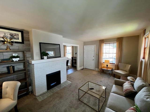 554 Laurel St, Chillicothe, OH 45601 - living room with plenty of natural light, carpet, and a brick fireplace
