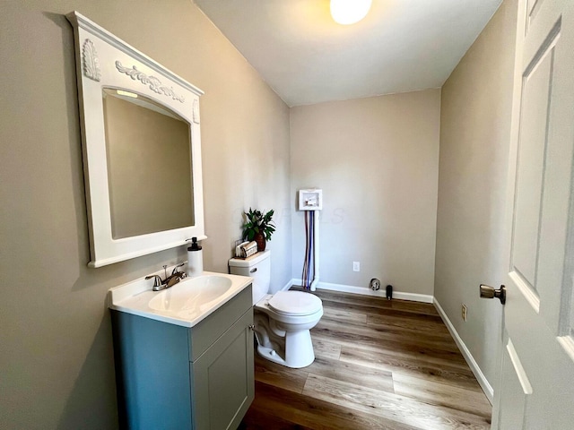 554 Laurel St, Chillicothe, OH 45601 - half bath with vanity and wood finished floors
