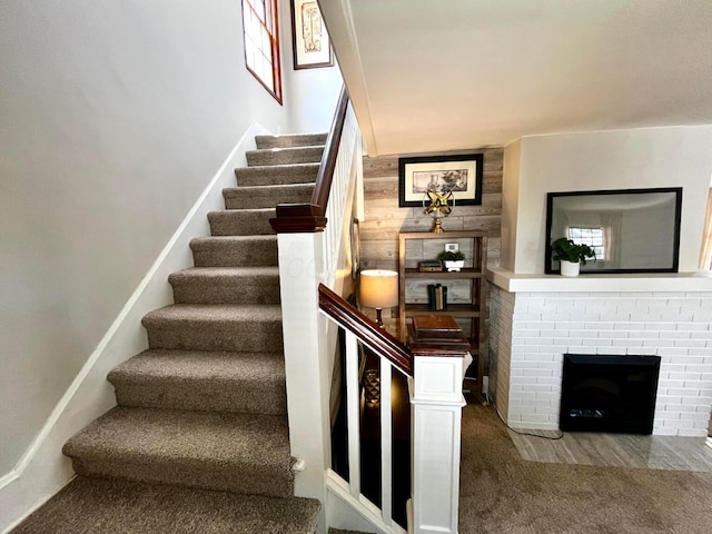 554 Laurel St, Chillicothe, OH 45601 - stairs featuring carpet floors and a brick fireplace