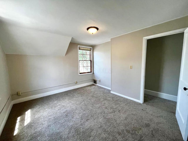 554 Laurel St, Chillicothe, OH 45601 - additional living space with carpet flooring and vaulted ceiling