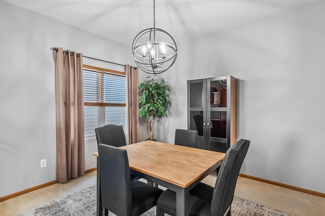861 Summerville Dr, Delaware, OH 43015 - dining area featuring a chandelier and light colored carpet